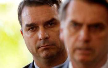 Flávio e Carlos Bolsonaro se solidarizam a policial morto e ignoram 24 vítimas