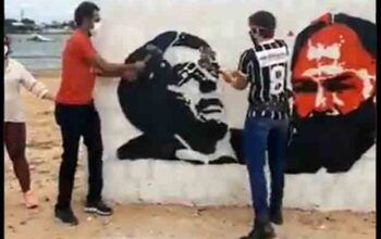 Manifestantes quebram muro à marretada com foto de Bolsonaro e Fernando Bezerra (vídeo)