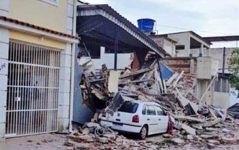 Prédio desaba e jovem morre nos escombros