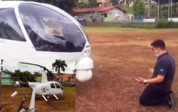 Piloto reza em frente a helicóptero da Globo após pouso forçado em MG