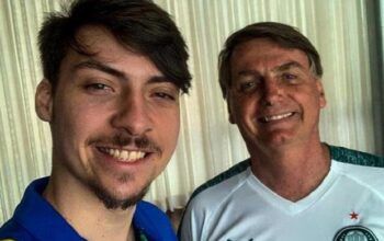 Polícia apreende documento de filho de Bolsonaro em escritório de empresário preso por fraude em venda de armas