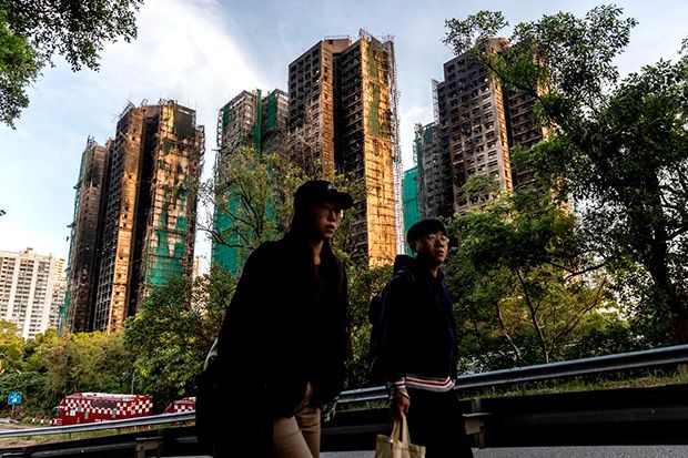 Incêndio que matou 128 pessoas em Hong Kong  é apagado após dois dias