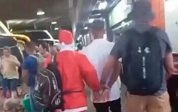 Policial disfarçado de Papai Noel prende bandido foragido da Justiça