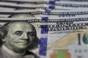 Dólar cai ao menor valor desde junho com alta do petróleo